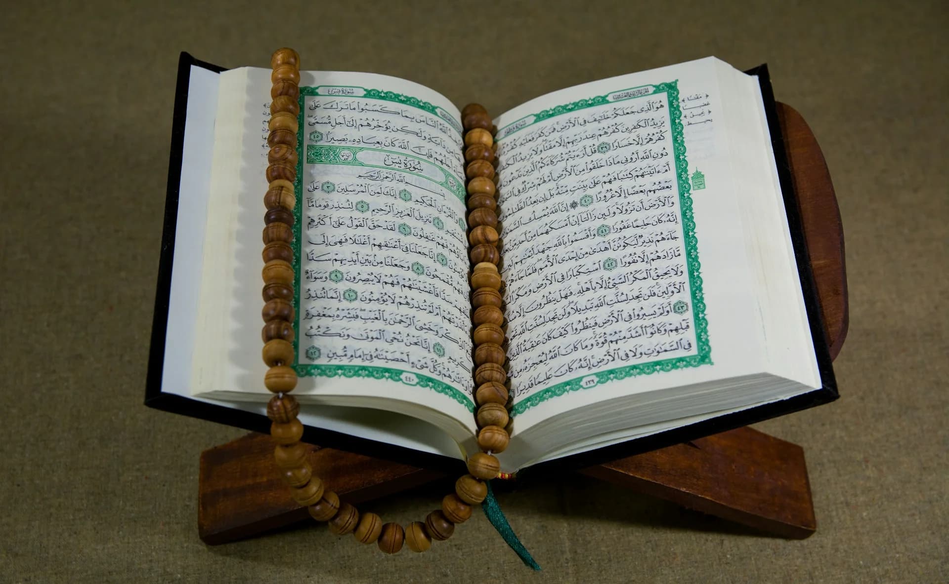 Open Quran page representing the concept of Tawheed in Islam